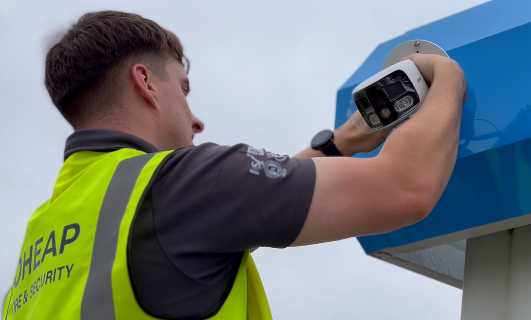 OHEAP Engineer Installing CCTV Camera