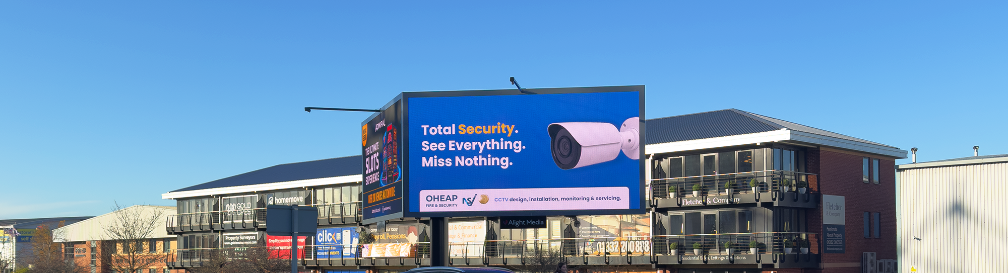 OHEAP Fire and Security billboard highlighting CCTV security system services